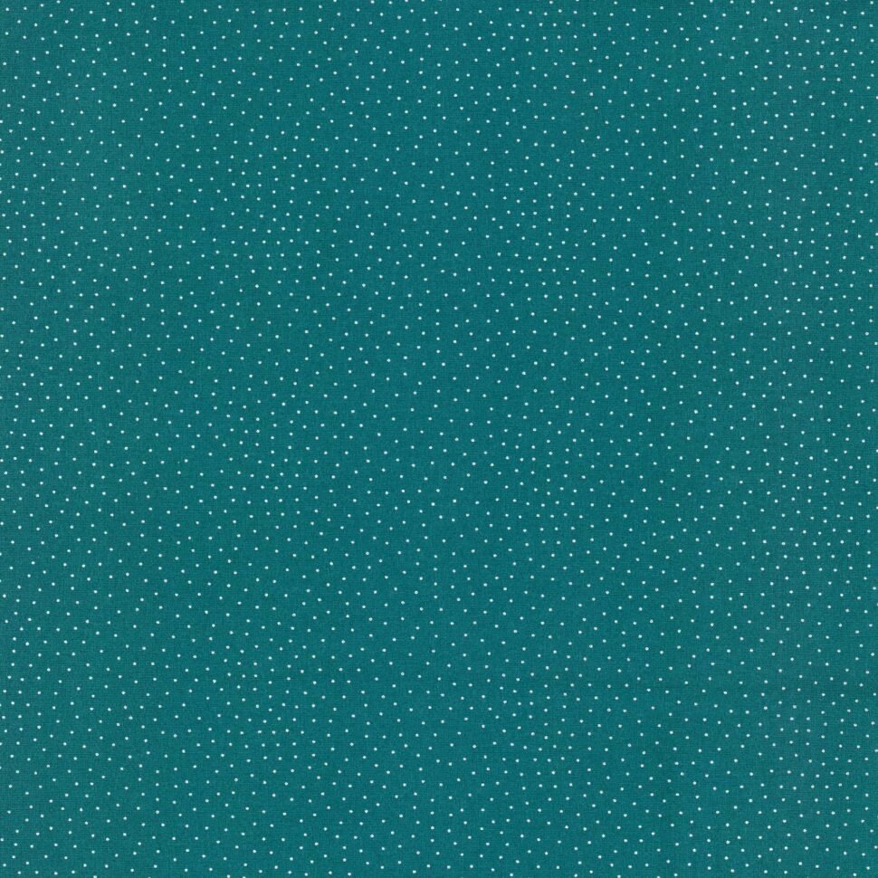 Teal fabric with small white polka dots evenly distributed across the surface.