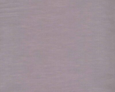 Close-up of light pink fabric with a subtle woven texture