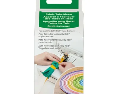 Packaging for Clover Fabric Tube Maker, a tool for making Jelly Roll rugs; shows hands sewing a fabric tube and a rainbow jelly roll.